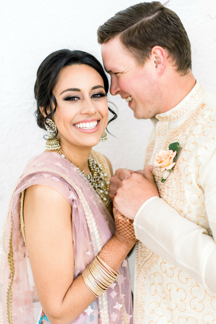 Happy couple in traditional Indian wedding dress