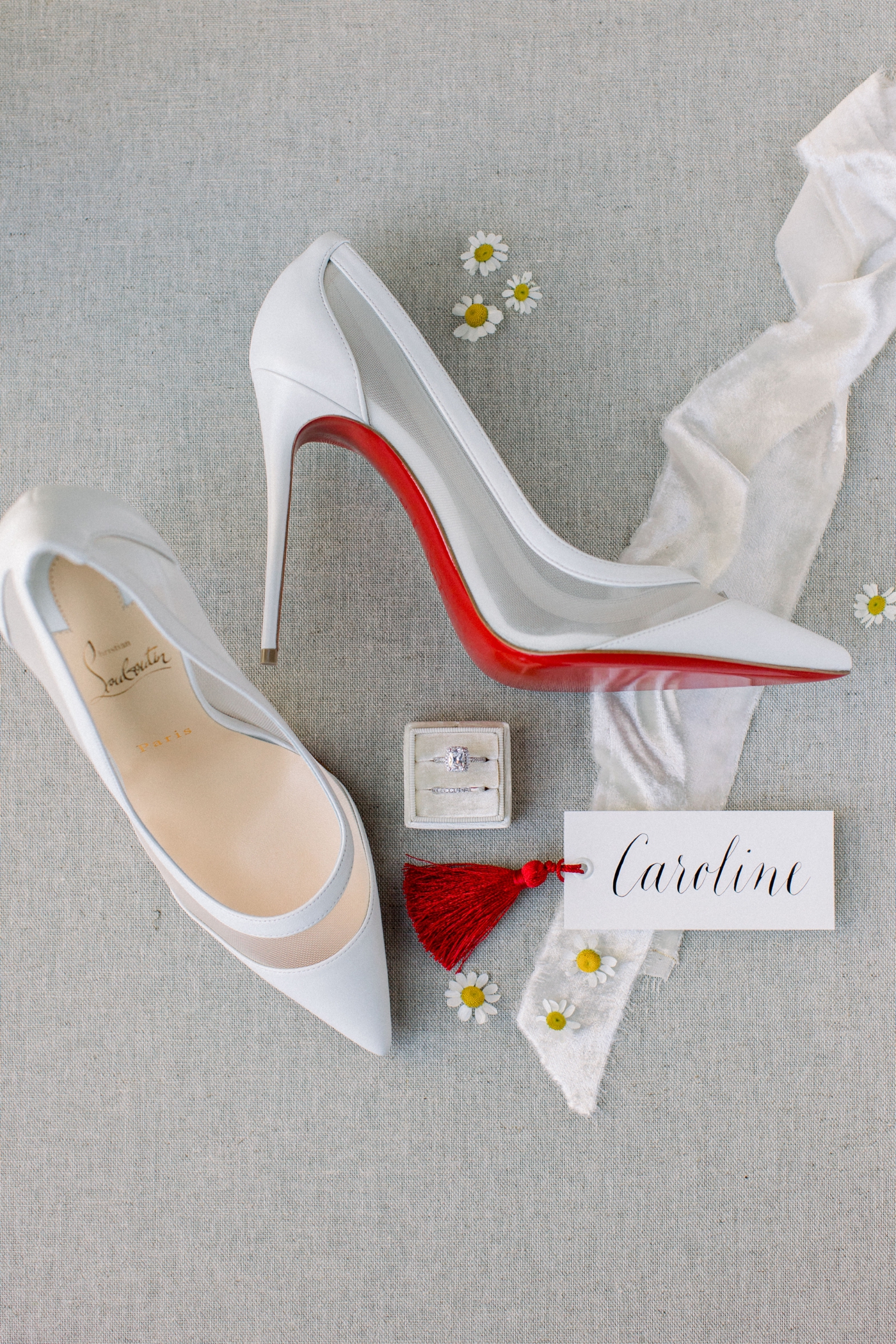 Bride in white Louboutin heels