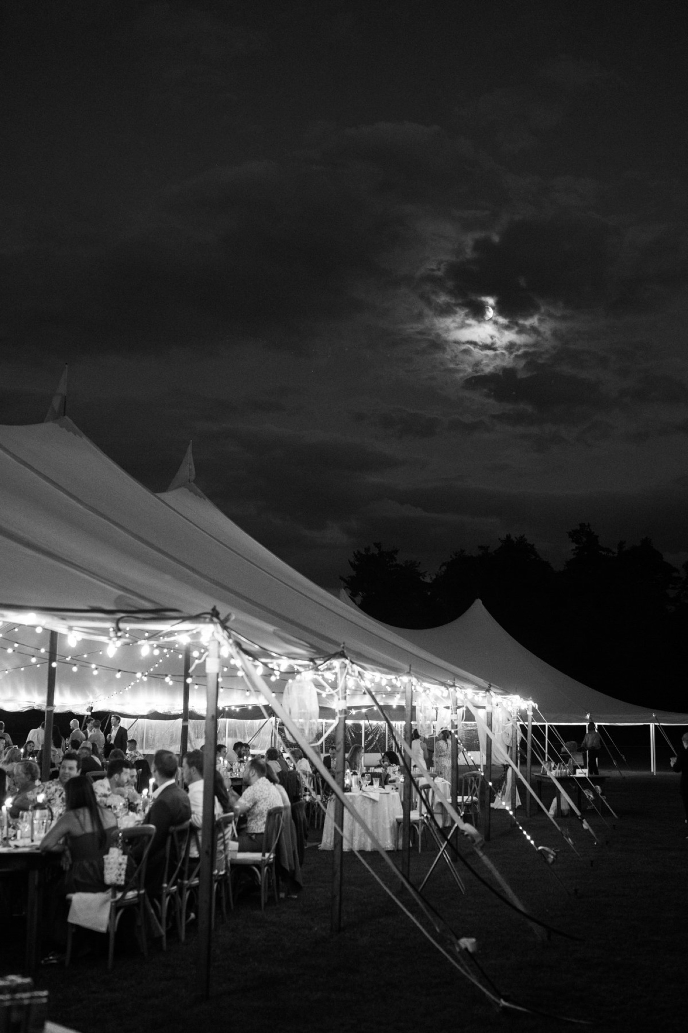 Outdoor tented wedding reception on the Palazzo Field at Brewster Academy