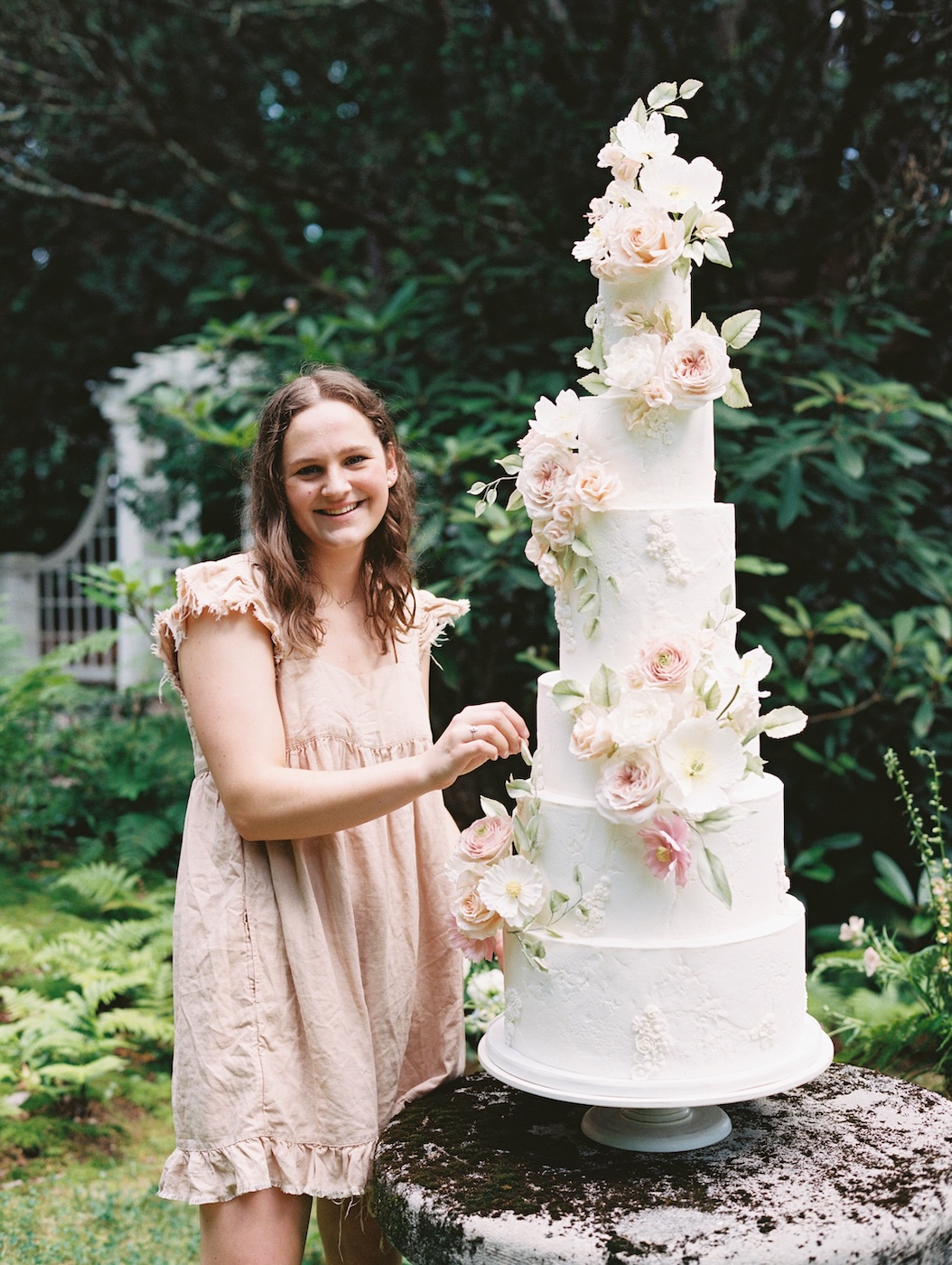 Grace Angulas with Graceful Baking wedding cake