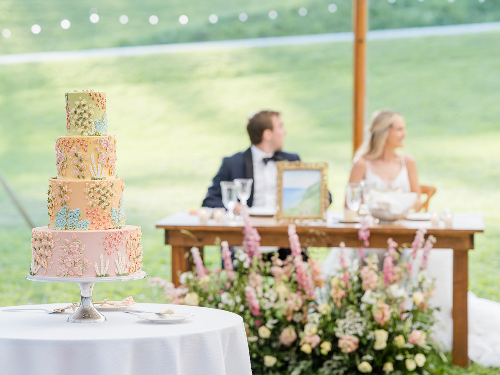 Custom-designed cake by A-Z Cakes, serving as both a stunning visual masterpiece and a delectable treat for guests at Nicole and Andrew’s Wedding